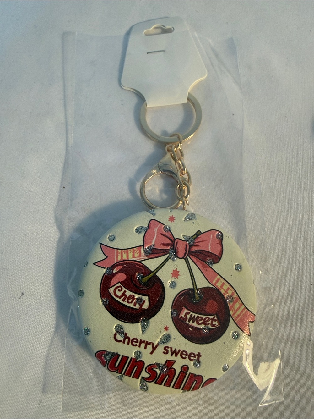 Fashion to Figure White Cherry Sweet Sunshine Round Keychain with Pink Bow